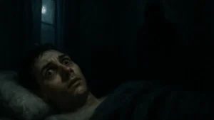 Uomo a letto con gli occhi aperti bloccato dalla paralisi del sonno