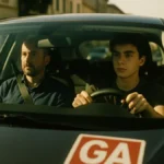 Giovane di 17 anni alla guida con accanto un adulto accompagnatore